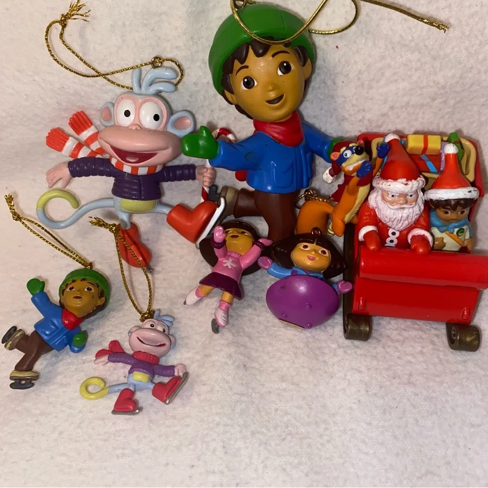 Go Diego and Dora holiday ornament characters with boots, swiped and Santa too!